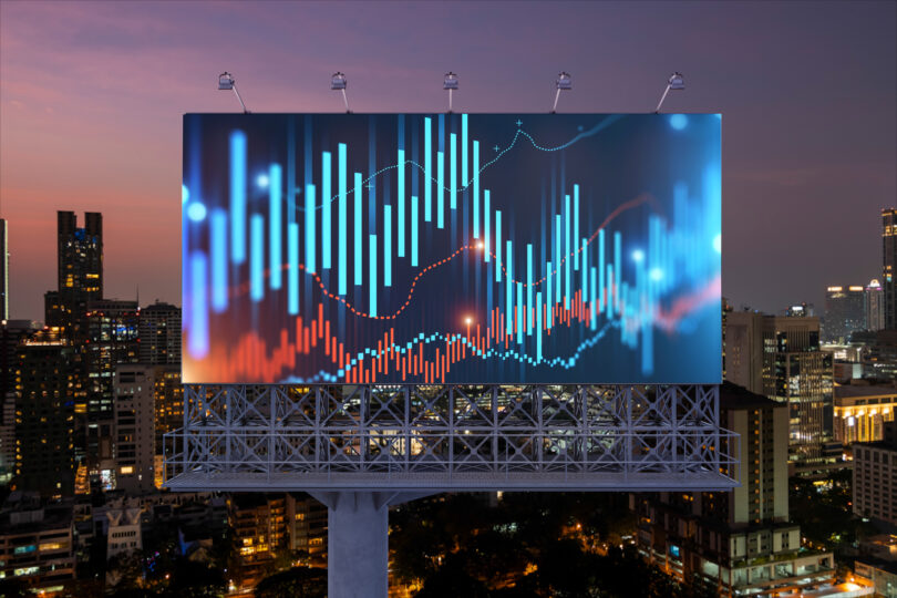 FOREX graph hologram on billboard, aerial night panoramic cityscape of Bangkok. The developed location for stock market researchers in Southeast Asia. The concept of fundamental analysis